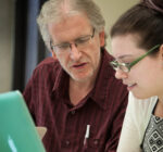 Central Oregon Community College photo Dr Novak speaks with a student.